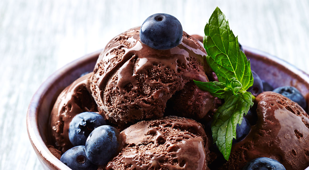 Delicious chocolate ice cream with blackberries